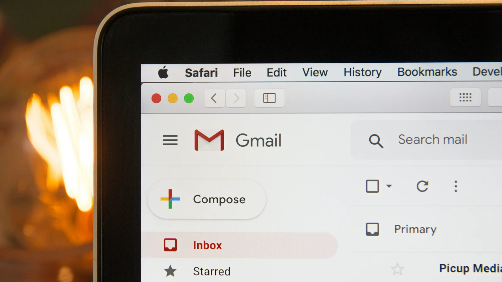 Laptop with an email inbox on screen, illustrative stock photograph.